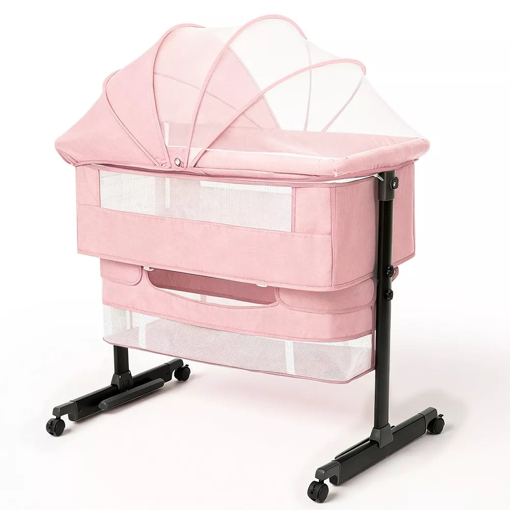Baby Bassinet Bedside Crib with Adjustable Height, Breathable Mesh Sides, Wheels and Storage Basket,Pink